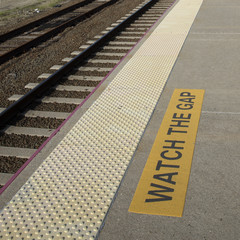 Watch the gap sign at railroad platform edge