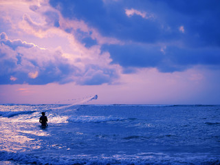 Fisherman on the beach of Kuta in Bali
