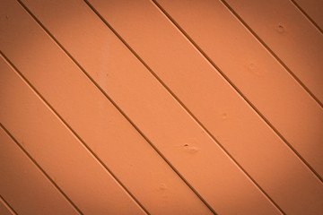 Obraz premium beautiful diagonal orange color wood background texture