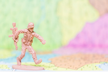 Toy Soldiers  on paper map background