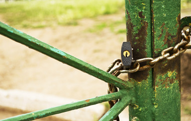 lock with a chain on the gate