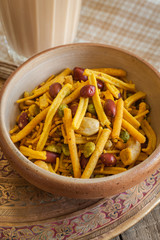 Chiwda or Bombay mix a spicy blend of fried noodles nuts and peas