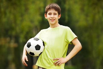 Happy boy with a soccer ball