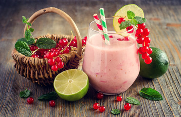 Healthy smoothie drink with red currant berries and lime, summer