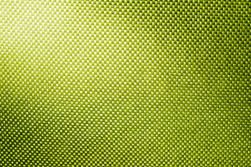 green fabric nylon background texture with light from corner