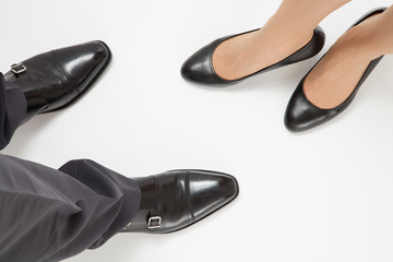 Businessman's and businesswoman's legs