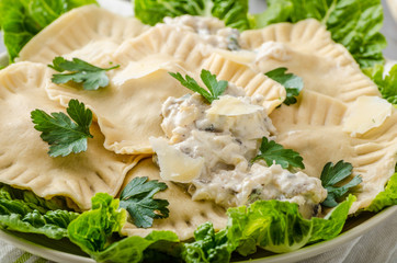 Ravioli stuffed with mushrooms and ricotta