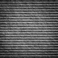 Close up black color corrugated paper texture