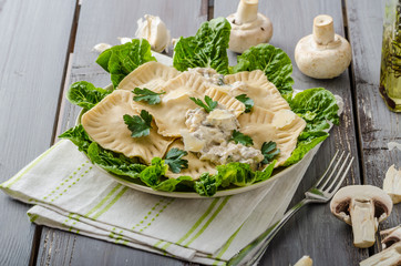 Ravioli stuffed with mushrooms and ricotta