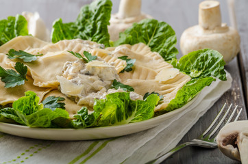 Ravioli stuffed with mushrooms and ricotta