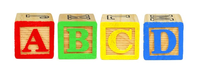 A B C D wooden toy letter blocks isolated on white