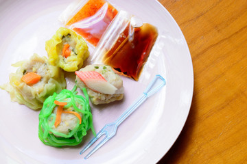 Delicious dim sims on dish