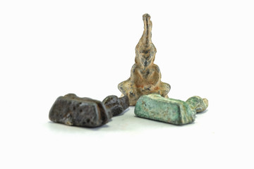 Thai amulats , It call thakadan older than 100 years isolated on white background