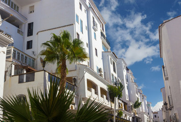 Fototapeta na wymiar streets with whitewashed buildings typical of Puerto Banus, Mala