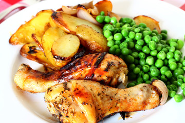 Chicken herbs dinner.
Chicken and herbs dinner with potatoes and garden peas.