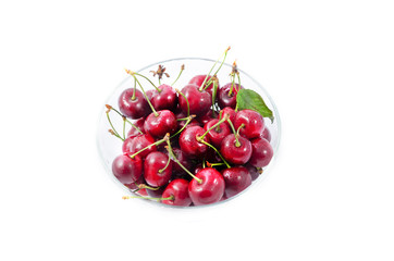 Heap of sweet cherries in a glass bowl