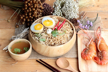 Instant noodles soup put egg and shrimp