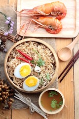 Instant noodles soup put egg and shrimp