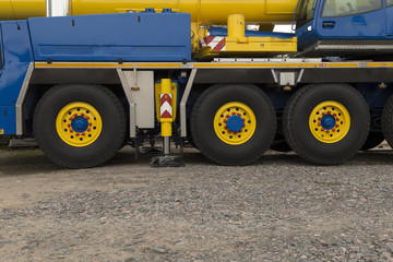 The Support leg and some wheels on a crane for industrial use