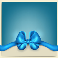 Greeting card with a blue bow