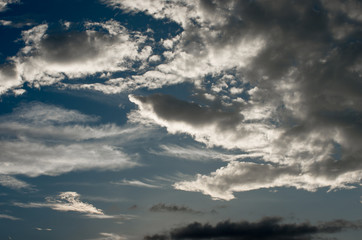 Fototapeta na wymiar Moody sky and fluffy clouds before storm