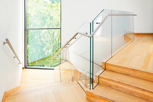 Modern architecture interior with wooden stairs
