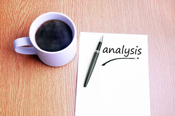 Coffee, pen and notes write analysis