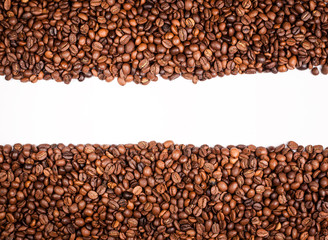 Frame of coffee beans on white background