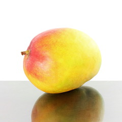 ripe mango fruit with shedow in pure white background
