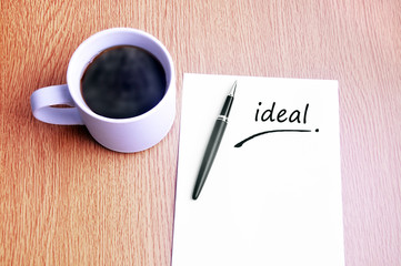 Coffee, pen and notes write ideal