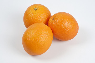 three fresh oranges fruit on white background	