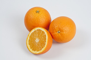 three fresh oranges fruit on white background