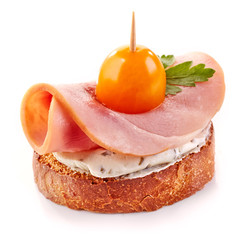 toasted bread slice with ham and tomato