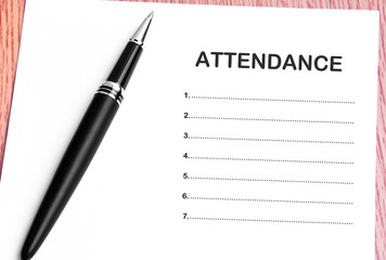 Pen  and notes paper with attendance list