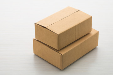 Paper box on wood background