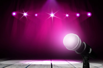 Microphone on wood stage background