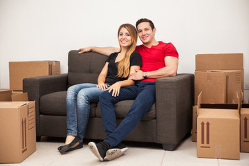 Couple taking a break from moving