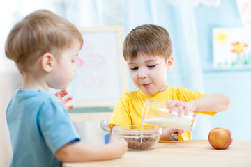 children eating healthy food at home