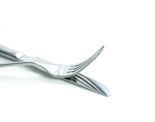 close up dinning silverware fork and knife  on white background
