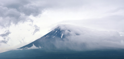 Fuji in stormy clouds