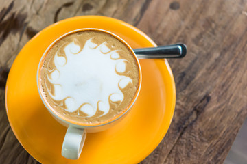 Yellow cup of coffee