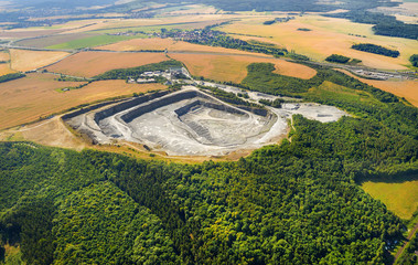 Aerial view of abandoned mine. Industrial landscape after mining.  © Kletr