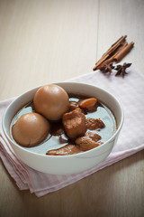 Eggs and pork in brown sauce