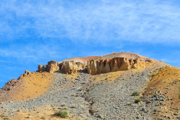 Fototapeta na wymiar Color soil of mercury deposits in Altai in Chagan-Ouzun place