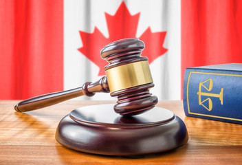 Richterhammer und Gesetzbuch - Kanada