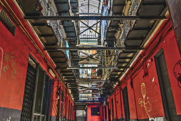 Naklejka premium Passage in the old town of Bucharest, Romania. The historical passage still used today, hosts several establishments.