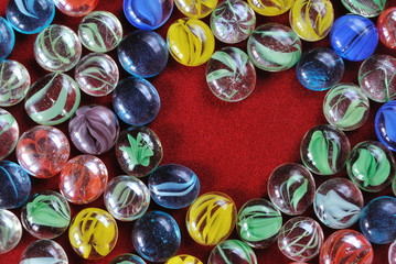 decoration pebbles stones heart shaped on red velvet background