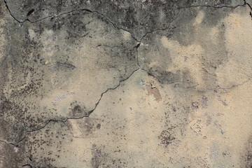 Gelb grau verputzte Betonmauer