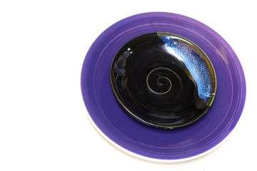 Purple dish with old dish