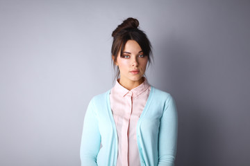 Portrait of an attractive fashionable young brunette woman